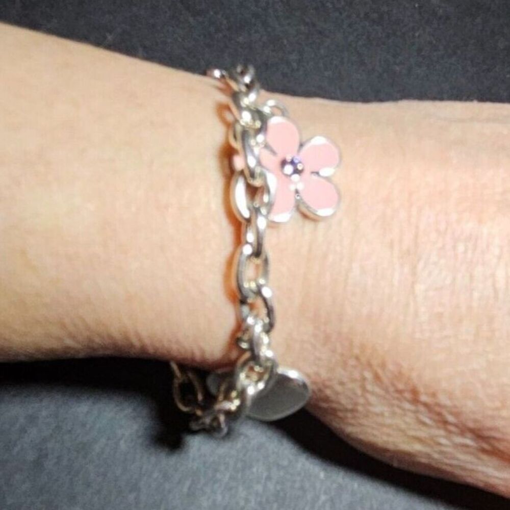 Nine West silver tone charm bracelet 6.25"